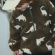 Konges Slojd dziecięca kurtka polarowa Joddy Teddy GRS Dino Silhouette